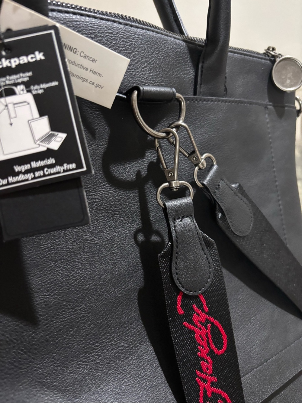 Ed Hardy Silver Metallic Backpack with Black Handles and Red Accents - Picture 8 of 15